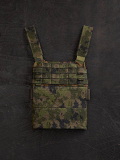 Savotta plate carrier front piece on a dark wooden surface