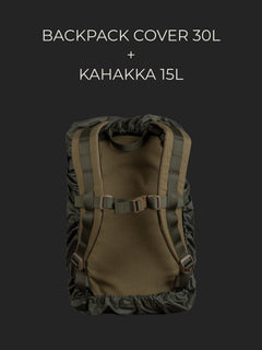 Savotta Kahakka 15L backpack covered with a Savotta backpack cover 30L on a dark background.