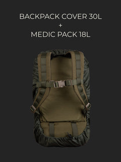 Savotta Medic pack 18L covered with a Savotta backpack cover 30L on a dark background.