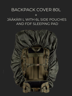 Savotta Jääkäri L backpack with two 6L side pouches and a FDF sleeping bag attached, all covered with a Savotta backpack cover 80L on a dark background.